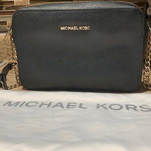 Black Micheal Kors body bag